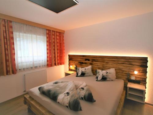 Postel nebo postele na pokoji v ubytování Apartment Franz by Interhome