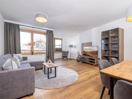 a living room with a couch and a table at Apartment Apartments Austria-5 by Interhome in Söll