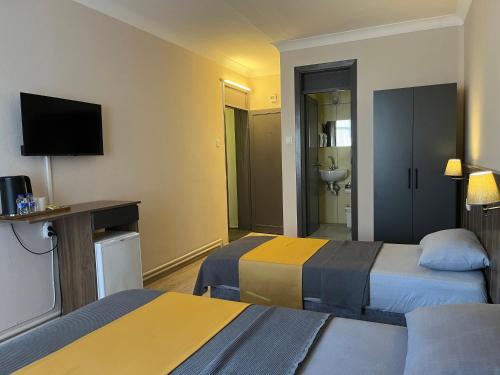 TV a/nebo společenská místnost v ubytování Cord Hotel & Resort