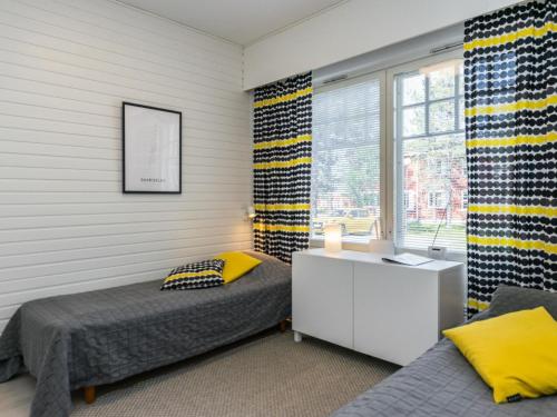 En eller flere senge i et værelse på Holiday Home Moitakuru a11 by Interhome