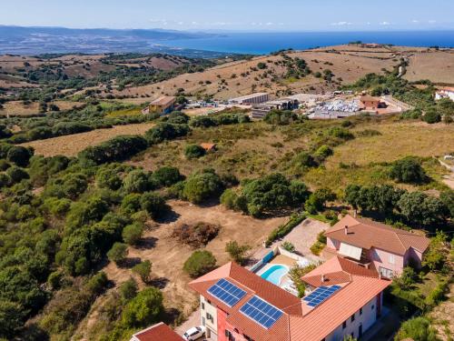 an aerial view of a house with solar panels on its roof at Apartment L'Oasi Trilo A6 by Interhome in Trinità dʼAgultu