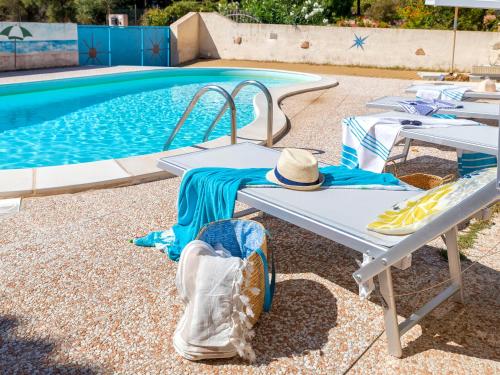 The swimming pool at or close to Apartment L'Oasi Bilo A1 by Interhome