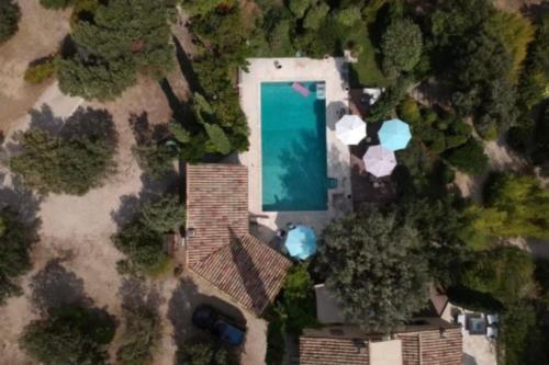 an overhead view of a swimming pool in a yard at Villa Maya in Puget