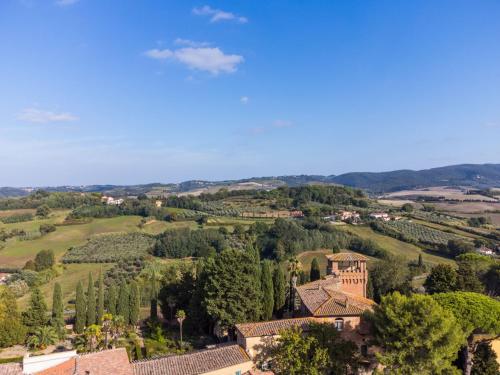 an aerial view of a villa in a valley with trees at Apartment Casa dei Granai by Interhome in Lorenzana