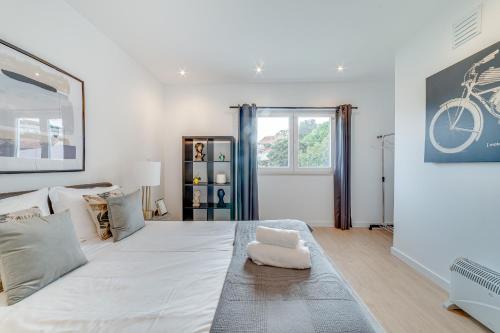 Postel nebo postele na pokoji v ubytování Cruzeiro Deluxe Apartments