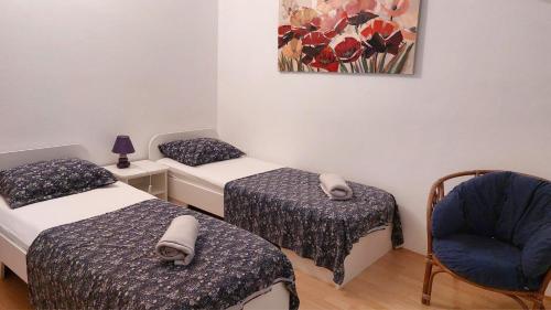 Postel nebo postele na pokoji v ubytování Apartments Rosa