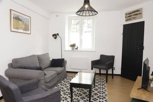Χώρος καθιστικού στο Appartement Le Moulin by La Boîte En Plus