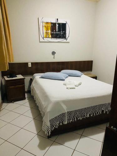 Postel nebo postele na pokoji v ubytování HOTEL DONA JOSA
