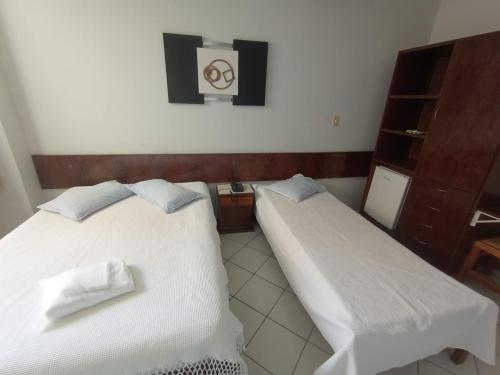 Postel nebo postele na pokoji v ubytování HOTEL DONA JOSA