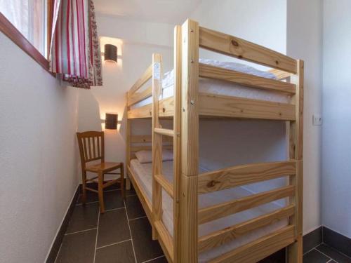 Ein Bett oder Betten in einem Zimmer der Unterkunft Les Aiguilles De Warens