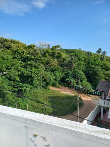 a view from the balcony of a house at Cliff house in Weligama