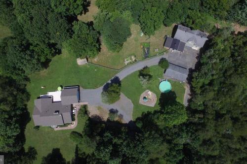 an aerial view of a house with a yard at Barnhouse+1000sqft PartySpace for rent@Gainesville 