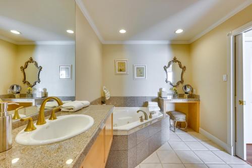 a bathroom with a tub and a sink and a shower at Serene Napa Retreat with Pool Access and Patio! in Napa