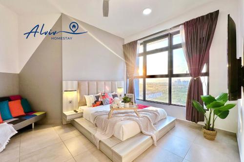 a bedroom with a large bed and a window at Atlantis Melaka I 5-11pax I 5min JonkerSt BY Alviv Management in Malacca