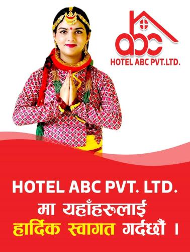 a poster of a woman performing a pray gesture at Hotel ABC Pvt. Ltd. in Bhairahawa