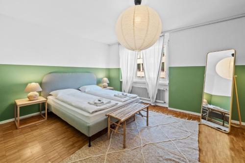 Giường trong phòng chung tại Beautiful Boutique Apartment DRAHTZUG14
