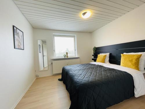 Postel nebo postele na pokoji v ubytování aday - Modern 3 bedrooms apartment in Svenstrup