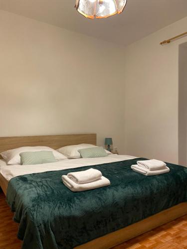 Postel nebo postele na pokoji v ubytování Hřensko 27 Apartmány