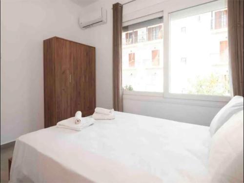 Postel nebo postele na pokoji v ubytování Mimikas Apartment