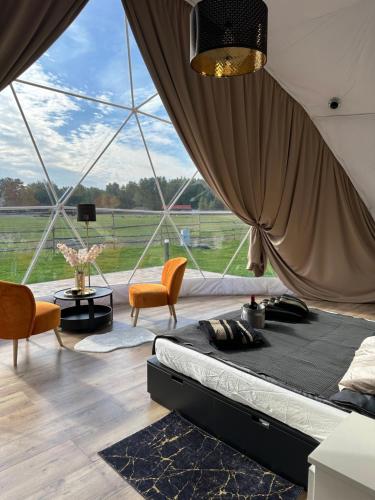 Posezení v ubytování Ranczo Targówka - Glampy i Domki