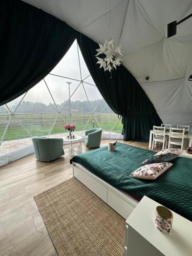 Posezení v ubytování Ranczo Targówka - Glampy i Domki