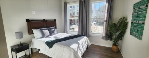 a bedroom with a bed and a window at Luxury in Fredericksburg in Fredericksburg