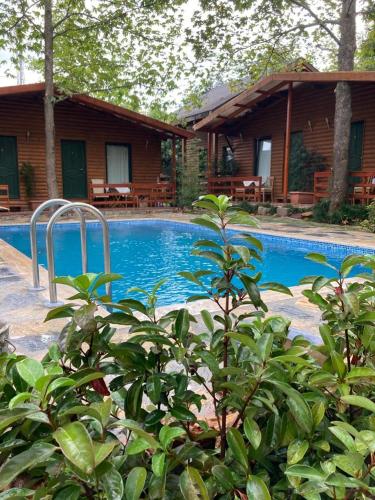 a swimming pool in front of a house at TATİL KEYFİ MOTEL in Kocaeli