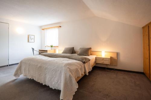 Postel nebo postele na pokoji v ubytování Hotel Alpina