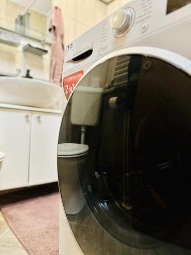 a close up of a microwave oven in a kitchen at Anchie in Zagreb
