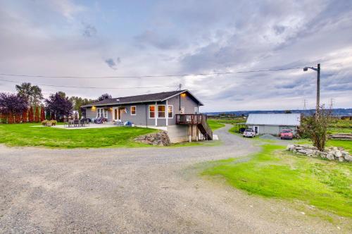 a house with a gravel road in front of it at Chic and Modern Snohomish Hideaway on a Working Farm in Snohomish