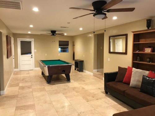 a living room with a pool table in it at Outback Campground and Marina in Trinity