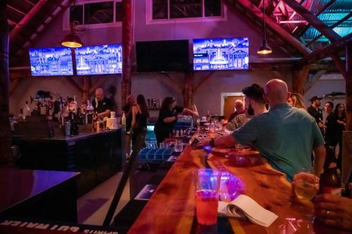 a group of people sitting at a bar at Dolphins Vacation Rental in Merritt Island