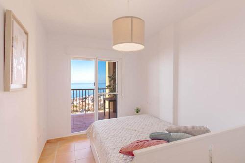 Postel nebo postele na pokoji v ubytování Torrox costa sea view