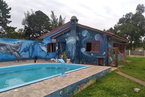 Πισίνα στο ή κοντά στο CASA OCEANO ITAPEVA