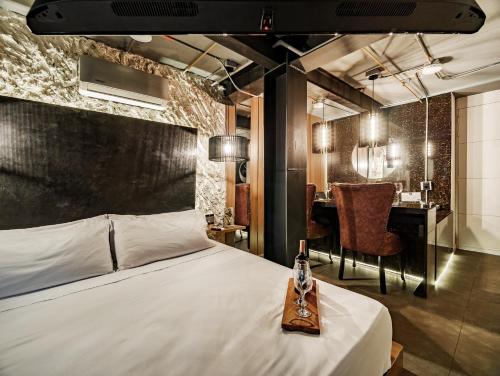 Ein Bett oder Betten in einem Zimmer der Unterkunft One Apartments Laureles