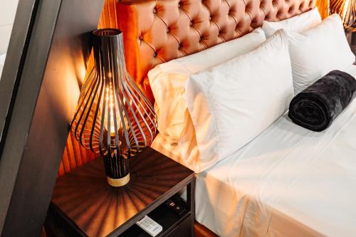 Ein Bett oder Betten in einem Zimmer der Unterkunft One Apartments Laureles