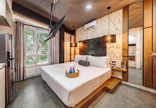 Ein Bett oder Betten in einem Zimmer der Unterkunft One Apartments Laureles
