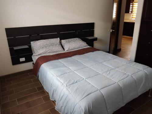 Postel nebo postele na pokoji v ubytování Casa 336 - New Home with Garage and Shared Community Pool