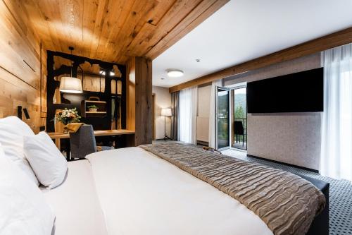 Llit o llits en una habitació de Rezidence Alpina