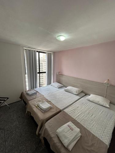 Katil atau katil-katil dalam bilik di Flat Atlântico Neto