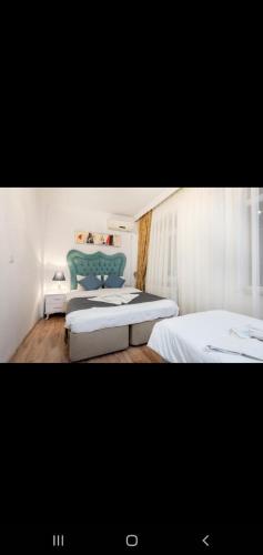 Ένα ή περισσότερα κρεβάτια σε δωμάτιο στο 3 FLOOR OLD CITY 1