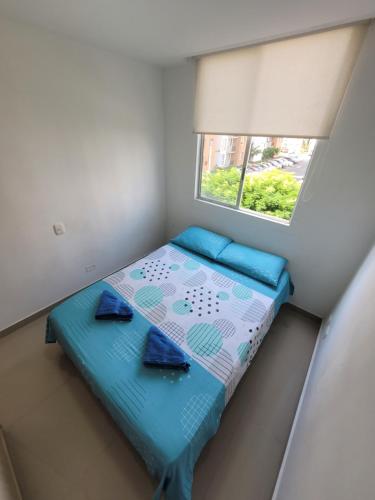 Posteľ alebo postele v izbe v ubytovaní Cali Piso 3 Sector Valle Del Lili Apartamento Acogedor