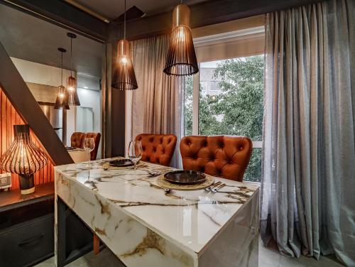 Ein Sitzbereich in der Unterkunft One Apartments Laureles