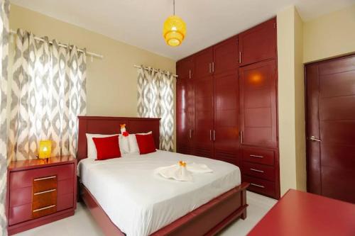 Postel nebo postele na pokoji v ubytování Tropical Oasis Villa