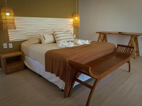 Lova arba lovos apgyvendinimo įstaigoje Hotel Terrazas del rio Negro