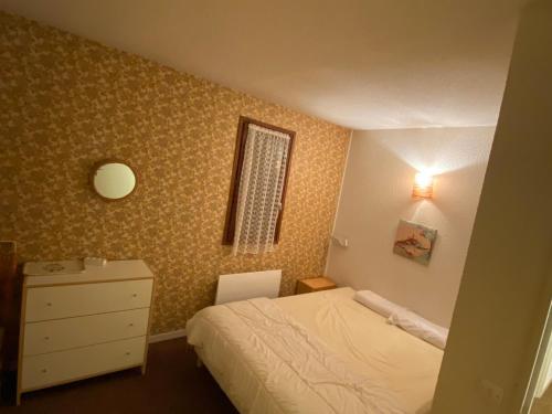 Säng eller sängar i ett rum på Appartement Autrans-Méaudre en Vercors-Autrans, 2 pièces, 6 personnes - FR-1-737-48