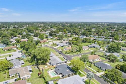 an aerial view of a small town with houses at Paradise Found Luxurious Retreat with Heated Pool in Rockledge