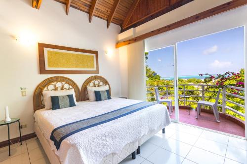 Giường trong phòng chung tại casa boutique los cedros