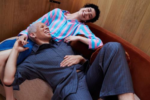 a man and a woman laying on a couch at W Budapest in Budapest