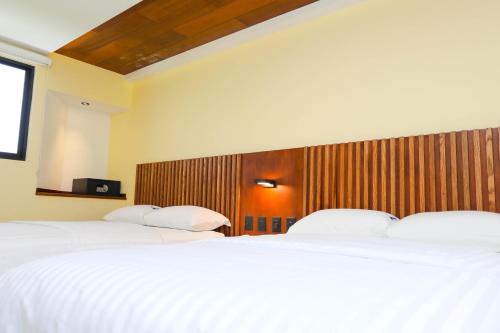 Ένα ή περισσότερα κρεβάτια σε δωμάτιο στο Hotel Parador